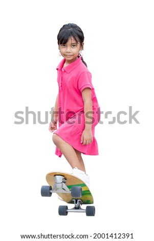 Asian little girl having fun with surfboards or surf skate is relaxing lifestyle on holiday isolated on white background.