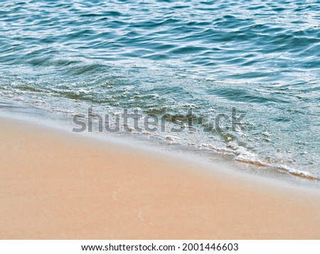 Beach sand sea water summer background.