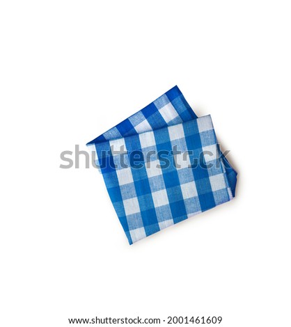 The checkered tablecloth. Decorative cotton napkin.