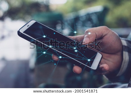 businessman hand finger touch on screen smartphone device for online trading network technology internet; mobile application