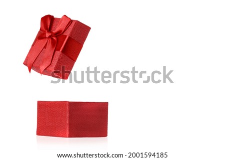 Opened red gift on a white background.