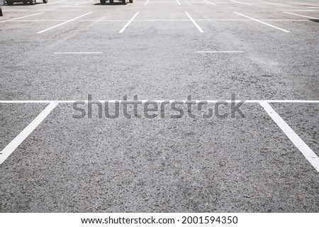Car parking spot on the street with white line in public areas.