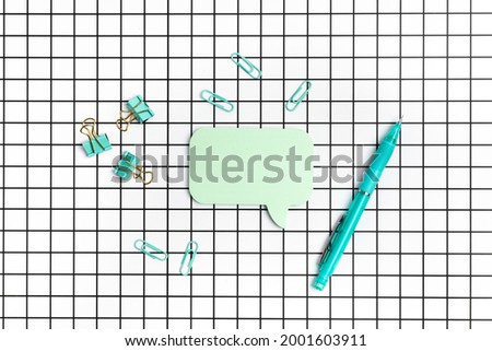 School stationery on checkered white background. Back to school idea
