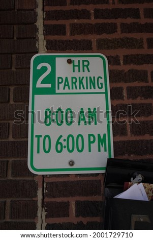 Two Hour Parking Lot Sign