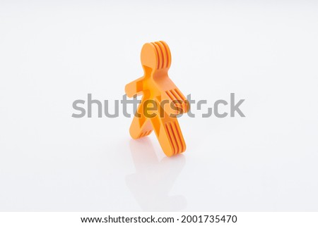 Rainbow, colorfull people concept. High resolution photo for graphic design. Single plastic person statuette.