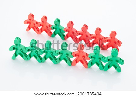 Rainbow, colourfull people concept. High resolution photo for graphic design. Different race, different skin colour concept, plastic people statuettes holdings hands.