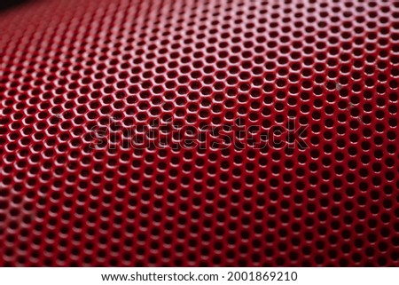 Red Wallpaper With Grid, closeup texture of fabric audio speakers