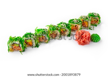 Sushi roll with crab meat, avocado and chukka seaweed. Japanese food. Sushi menu for restaurant isolated on white background
