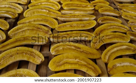 'Sale Pisang', Indonesian traditional food made from dried bananas. The picture was taken when the bananas were drying in the sun in the yard