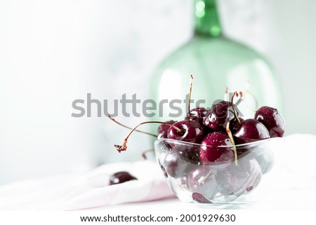 Freshly washed red and ripe cherries. Delicious and juicy cherries. Summer fruit. Still life photography