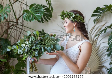 Waiting for a baby. Pregnant woman on country nature background