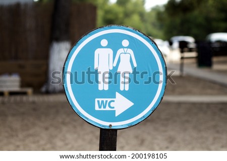 man and woman toilet sign