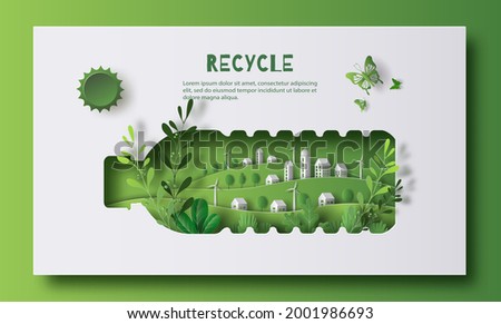 A bottle of water with a green city inside, the idea is to recycle old plastic bottles, think green, paper illustration, and 3d paper. Royalty-Free Stock Photo #2001986693