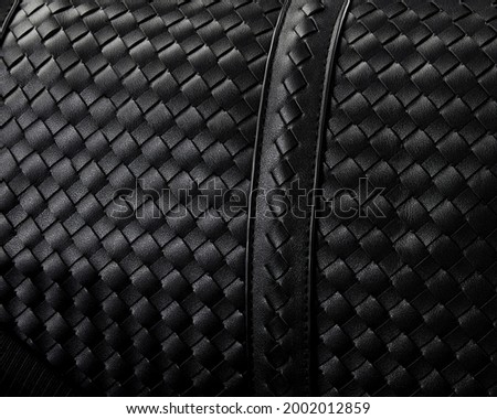 close-up photo of bag Carbon fiber texture