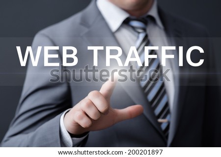 business, technology, internet and networking concept - businessman pressing web traffic button on virtual screens 