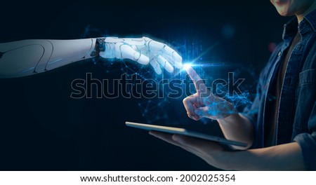 Artificial intelligence, futuristic digital technology robot and man hand finger pointing touch data transfer, NFT, metaverse, crypto, blockchain, internet cyber security VPN network solution Royalty-Free Stock Photo #2002025354