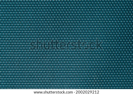 Top view close up or macro of  colorful blue cotton cloths fabric made of heathered yarn textured background or wallpaper and abstract concept 