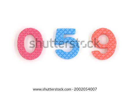 number 059 isolated on white background. Colorful letters on background close up. Alphabet toy. Number fifty nine.