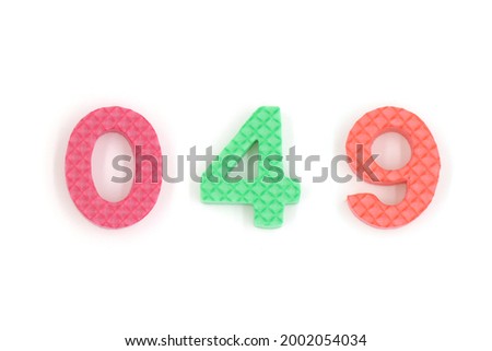 number 049 isolated on white background. Colorful letters on background close up. Alphabet toy. Number forty nine.