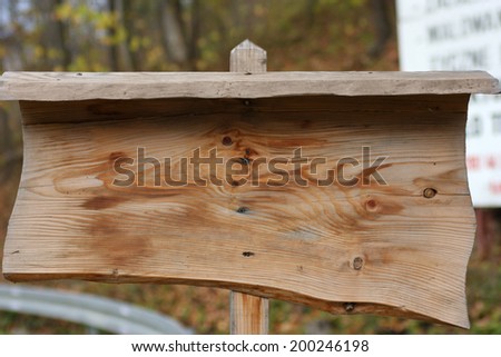 Empty wooden table, ready for your sign