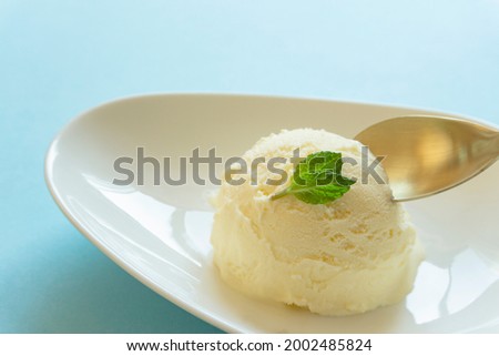 Ice cream on light blue background