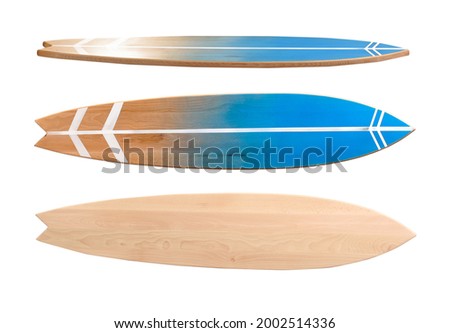 Different view of wooden surfboard on white background Royalty-Free Stock Photo #2002514336