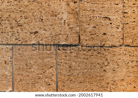 Close up wall of shell rock. Wall background. Wall of shell rock blocks texture background