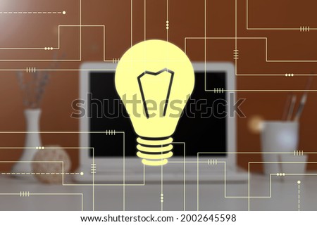 Creative light bulb illustration on a modern laptop computer background, future technology concept.