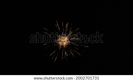 Fireworks in the night sky Royalty-Free Stock Photo #2002701731
