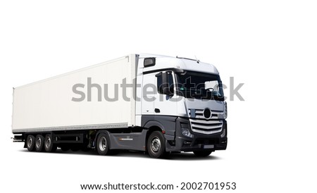 Driving white truck isolated on white backgrund  Royalty-Free Stock Photo #2002701953