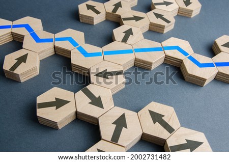 Blue optimal path among all possible movement options. Business strategic planning, risk management. New markets opportunities. Action plan, solution path. Optimization, adjustment of the process. Royalty-Free Stock Photo #2002731482
