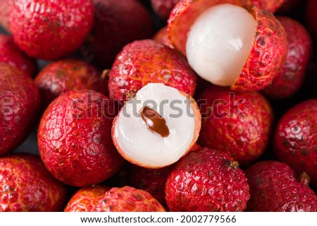 fresh litchi, lichee, lychee, or Litchi chinensis background Royalty-Free Stock Photo #2002779566