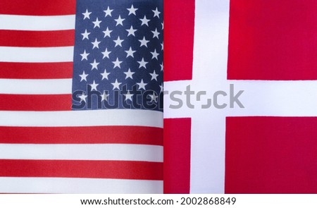 fragments of the national flags of the USA and Denmark in close-up