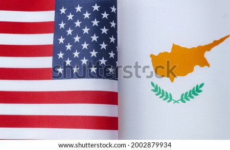fragments of the national flags of the United States and Cyprus close-up