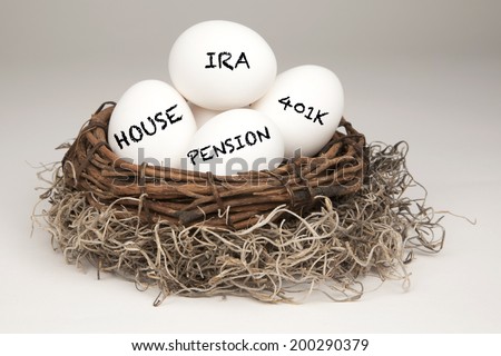 White eggs in a brown nest labeled with IRA, Pension, 401k and House representing a typical nest egg. Royalty-Free Stock Photo #200290379