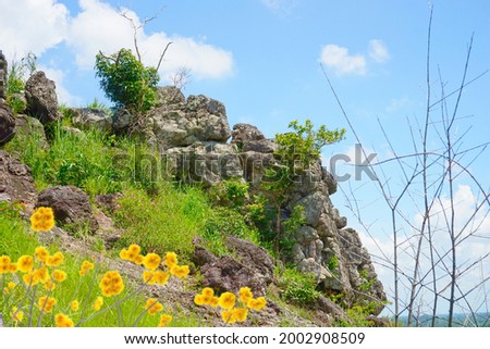 Stone on the hill with blue sky background