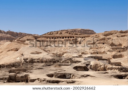 View of the Tombs of the Nobles in west bank of Luxor . Egypt Royalty-Free Stock Photo #2002926662