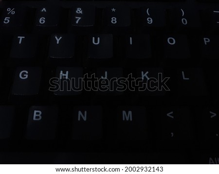 this dark keyboard for elegant background take at my office in Bandung city, Indonesia
