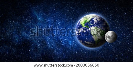 Earth and moon in dark space. blue planets with the moon as a satellite. Elements of this image furnished by NASA
