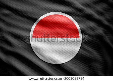 Indonesia flag isolated on black background. National symbols of Indonesia.