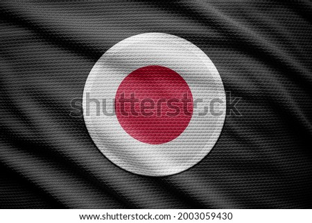 Japan flag isolated on black background. National symbols of Japan.