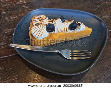Abstract photo of delicious Lemon meringue pie is dessert pie recipe consisting of shortened pastry base filled with lemon curd and topped with meringue