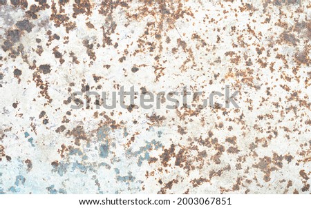Corroded metal background Rusted grey painted metal wall Rusty metal background with streaks of rust Rust stains The metal surface rusted spots Rusty corrosion