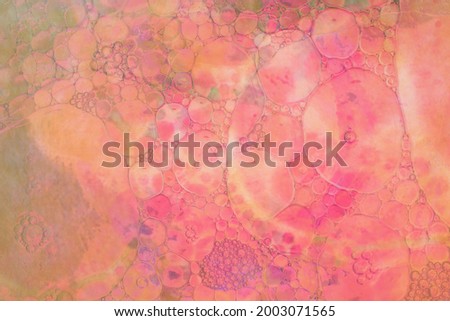 Abstract colourful background oil drops on water surface. Double exposure and mixed layers.