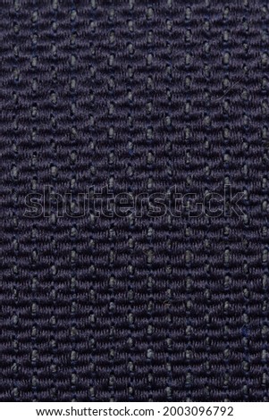 the texture of the furniture fabric of dense weaving