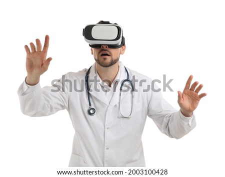 Doctor using virtual reality headset on white background
