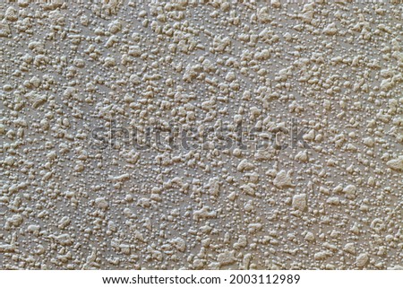 The texture of paper wallpaper for painting beige color to perform the design