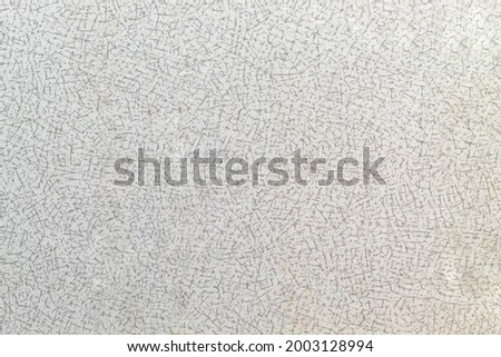 Smooth and even texture of the kitchen table surface with small patterns