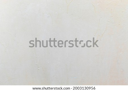 Smooth but uneven texture of the surface of an old wooden door
