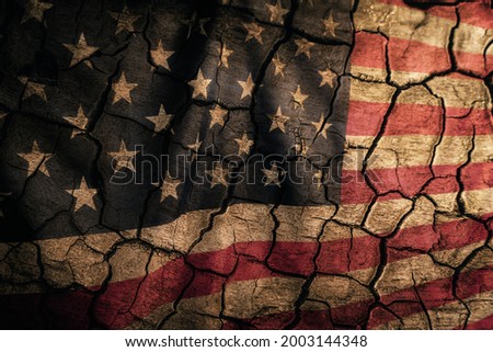 Aged cracked flag of the United States of America is Independence Day and Memorial Day